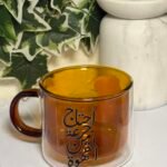 كوب بني شفاف